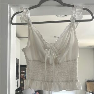 Chic White Sleeveless Top with Lace Details